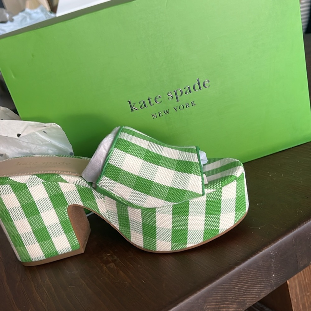 Brand new Kate Spade platform sandals. Never been worn.